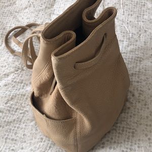Authentic Coach tan bucket drawstring backpack